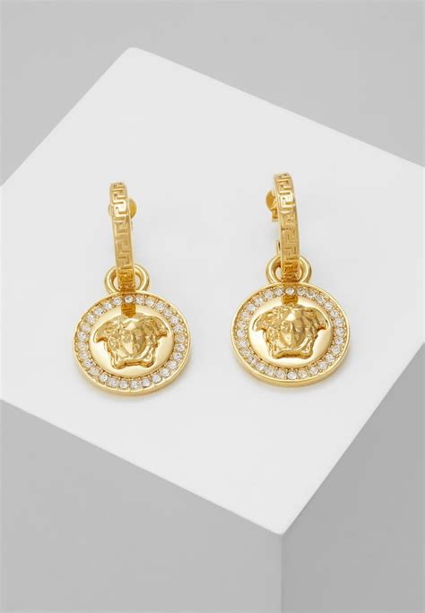 Boucles d'oreilles de luxe Versace .